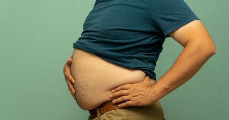 Man with a bloated belly from gas